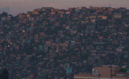 Aerial view of cityscape against sky