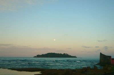 Scenic view of sea at sunset