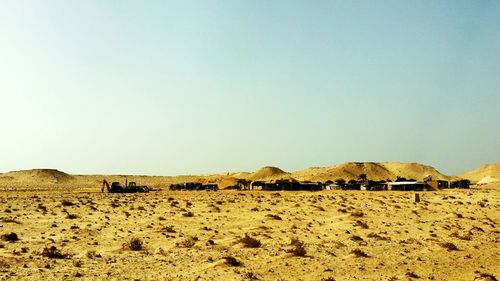 Scenic view of desert against clear sky