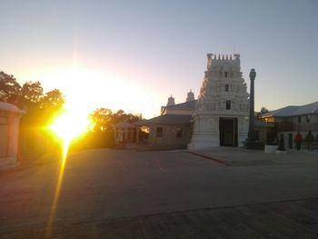 Built structure against sky at sunset