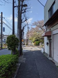 Street amidst buildings against sky