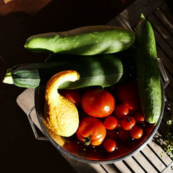 High angle view of fruits in plate on table