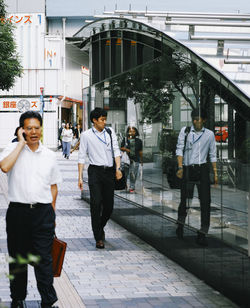 Full length of woman standing in city