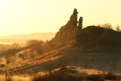 Scenic view of landscape against sky during sunset. devils wall 