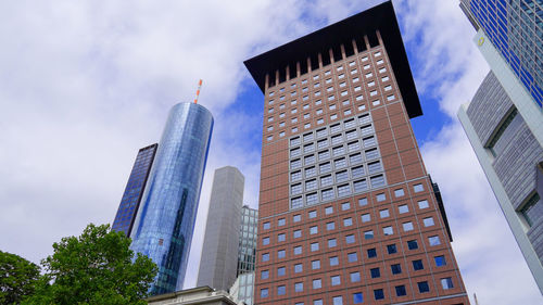 Low angle view of skyscrapers against sky