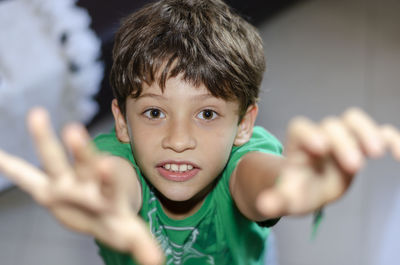 Top view portrait of a cheerful, playful child looking at the camera. happiness concept. 