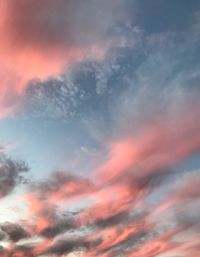 Low angle view of dramatic sky during sunset