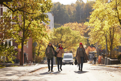 View of friends walking together