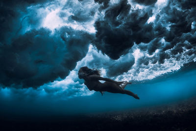 Man swimming in sea