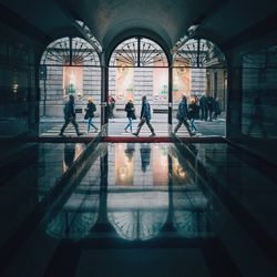 View of woman walking in corridor