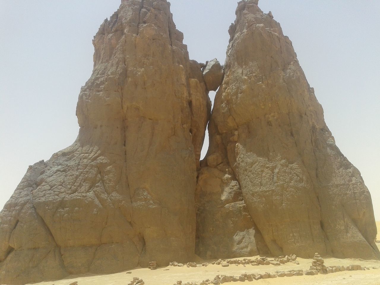 LOW ANGLE VIEW OF ROCK FORMATION