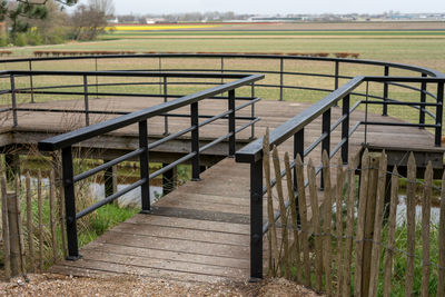 Footpath by fence