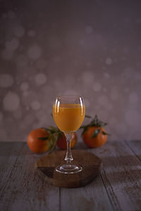 Close-up of wine glass on table