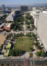 High angle view of street amidst buildings in city