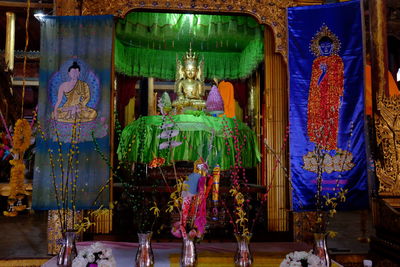 Illuminated lanterns hanging at night