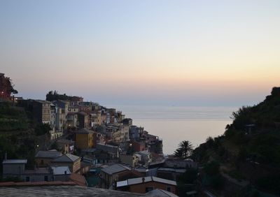 High angle view of town at sunset