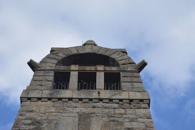 Low angle view of old building against sky