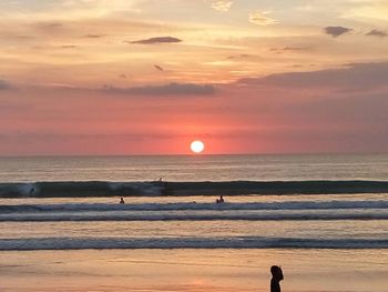 Scenic view of sea at sunset