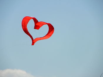 Low angle view of flag against clear sky