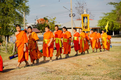 Group of people standing at temple