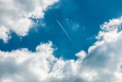 Low angle view of vapor trail in sky