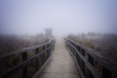 View of footpath in foggy weather