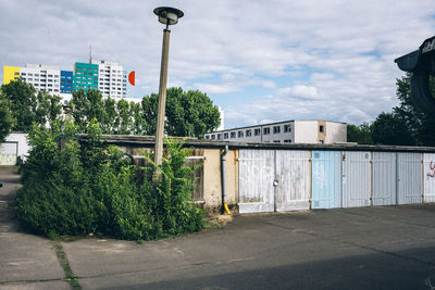 View of buildings against cloudy sky