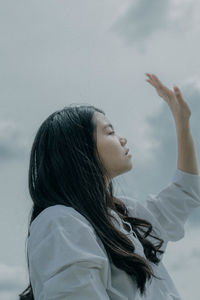 Portrait of a young woman in water