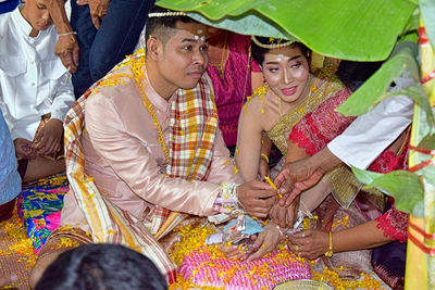 Group of people sitting in temple