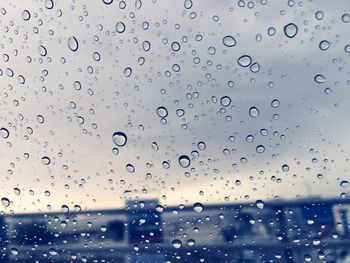 Close-up of water drops on glass