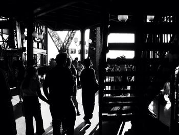 Silhouette of woman in shopping mall