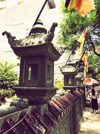 Statue in front of building