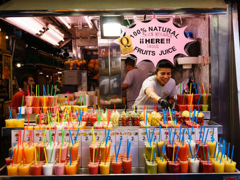 People at market stall