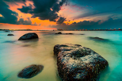 Scenic view of sea against sky during sunset