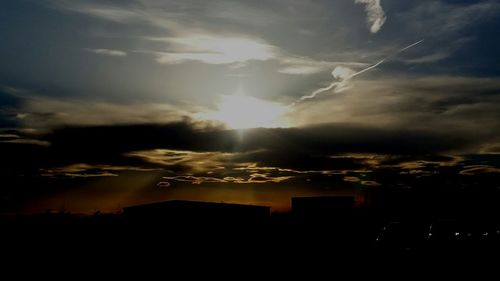 Silhouette landscape against sky during sunset