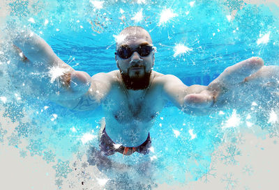 Man swimming in pool