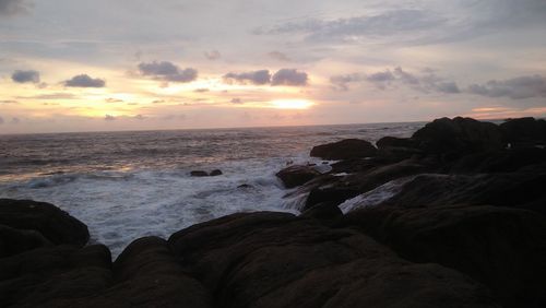 Scenic view of sea against sky during sunset