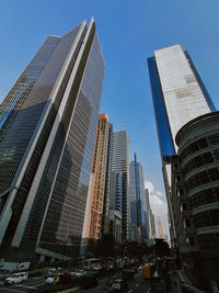 Low angle view of modern buildings against sky