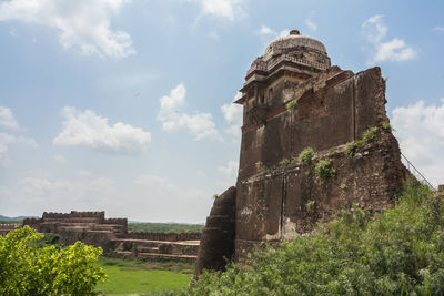 Low angle view of old ruins against sky