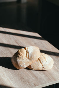 High angle view of bread on cutting board