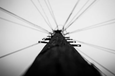 Low angle view of cables against clear sky