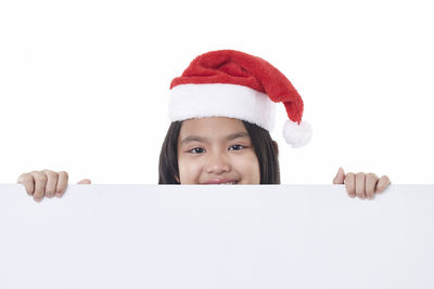 Portrait of a girl against white background