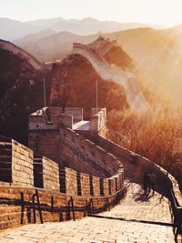 Buildings against mountain range