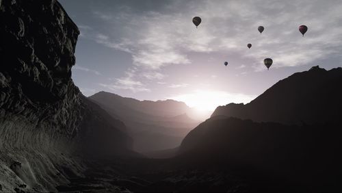 Scenic view of mountains against sky during sunset