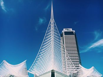 Low angle view of modern buildings against sky