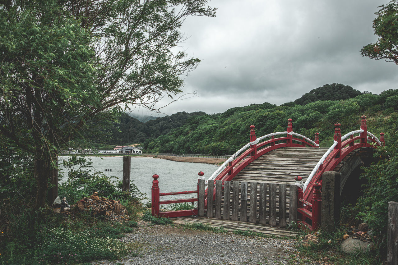 plant, tree, nature, sky, water, cloud, no people, environment, beauty in nature, architecture, park, scenics - nature, tranquility, transportation, land, outdoors, day, mountain, travel destinations, rural area, landscape, forest, bridge, overcast, tranquil scene, built structure, non-urban scene, travel, tourism, lake