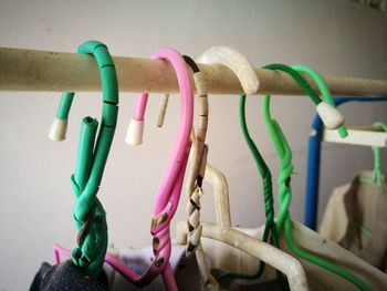 Close-up of multi colored hanging on clothesline