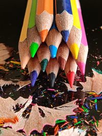 High angle view of multi colored pencils on table