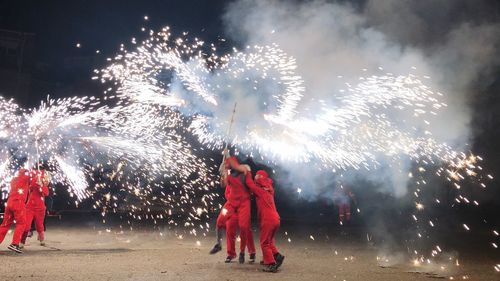 Firework display at night