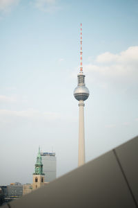 Low angle view of fernsehturm against sky